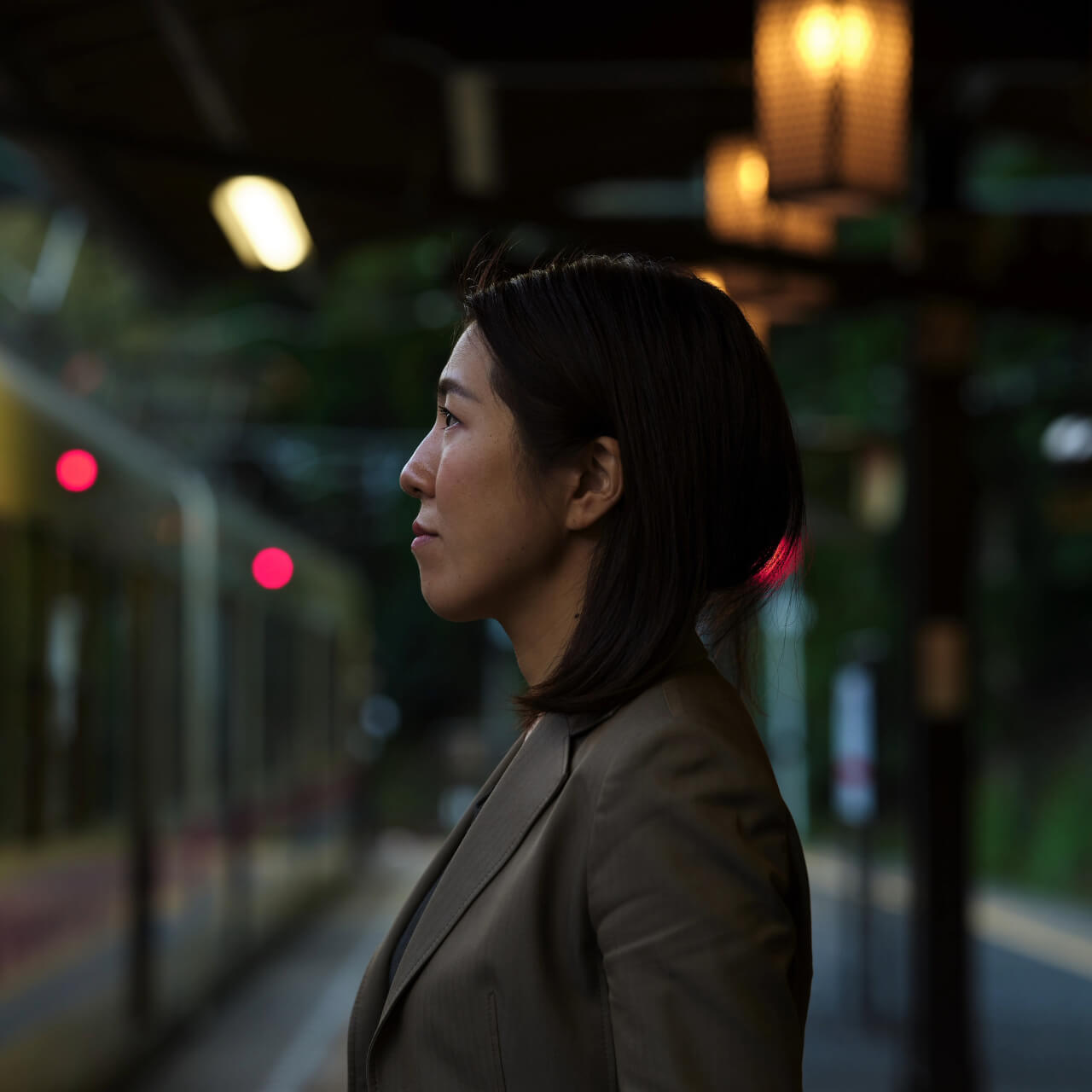 Woman's profile from the left side looking straight ahead